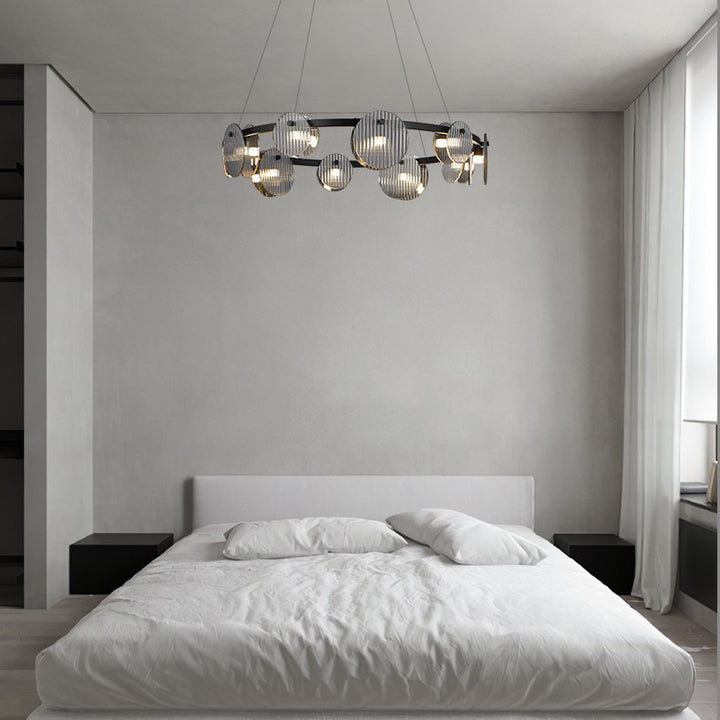 Lámpara de araña LED moderna minimalista de aros de hierro, vidrio y acrílico para salón 