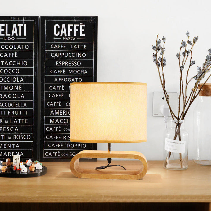 Lámpara de mesa contemporánea nórdica de cilindro de tela de madera elíptica de 1 luz para estudio 