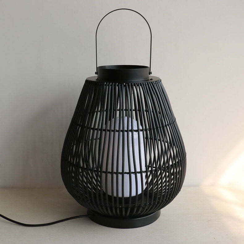 Moderner Outdoor-Rattan-gewebter, käfigförmiger 1-Licht-Außenlandschaftslicht 