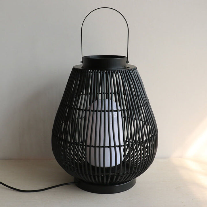 Moderner Outdoor-Rattan-gewebter, käfigförmiger 1-Licht-Außenlandschaftslicht 