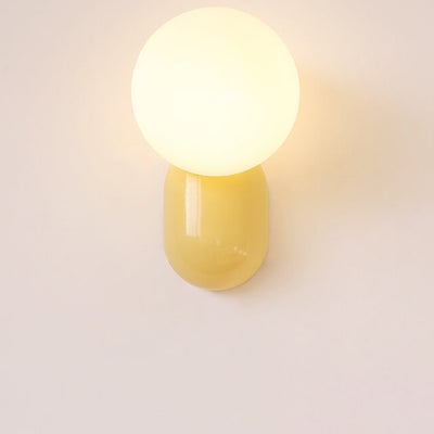 Macaron-Creme-Stil Harz-Glaskugel 1-Licht Wandleuchte 