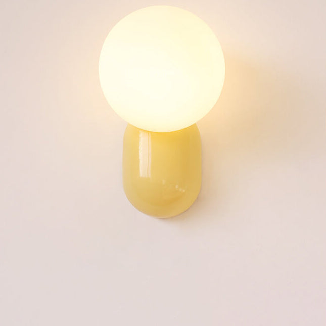Macaron-Creme-Stil Harz-Glaskugel 1-Licht Wandleuchte 