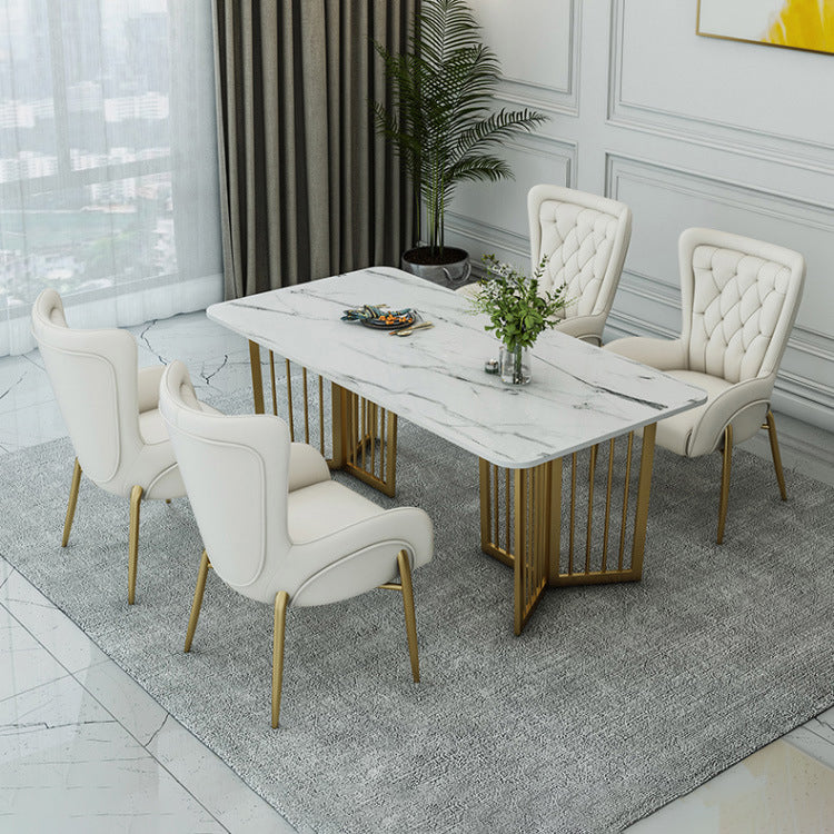 Moderna silla de comedor de lujo cuadrada curva de PU cuero terciopelo hierro con respaldo y brazo para comedor 