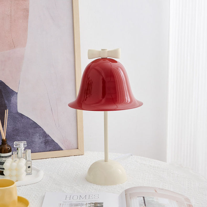 Moderne minimalistische Tischleuchte mit Schleifenglocke im Creme-Ton und LED 