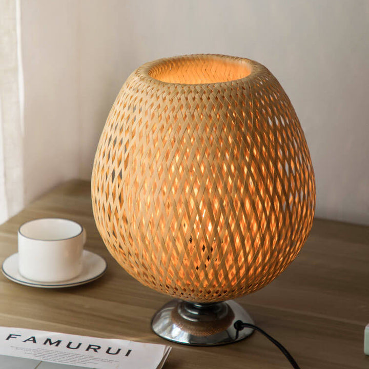 Traditional Chinese Moso Bamboo Wood Iron Weaving Oval Round 1-Light Table Lamp For Bedroom