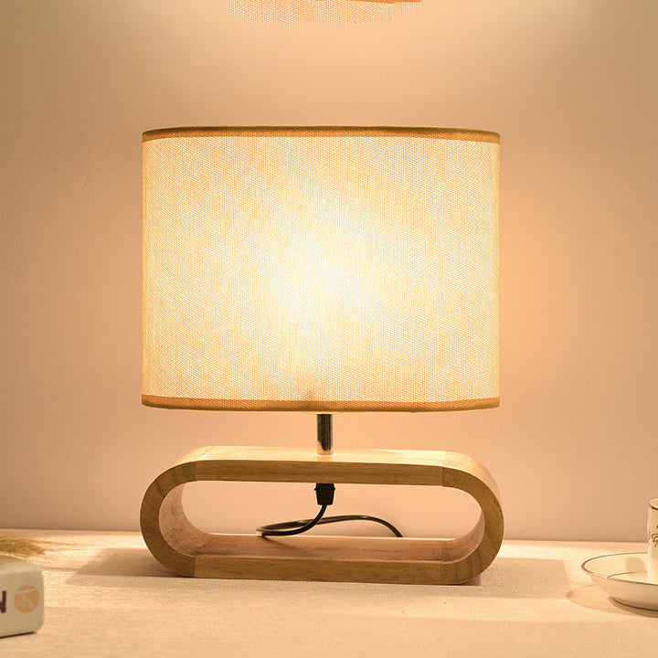 Lámpara de mesa contemporánea nórdica de cilindro de tela de madera elíptica de 1 luz para estudio 