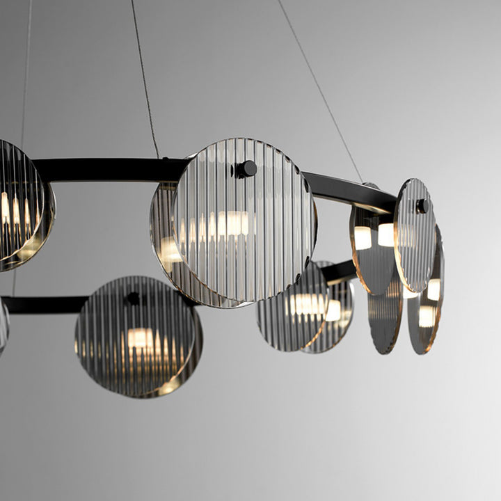 Lámpara de araña LED moderna minimalista de aros de hierro, vidrio y acrílico para salón 