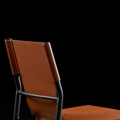 Silla de comedor apilable con respaldo de cuero nórdico contemporáneo y acero al carbono para comedor 