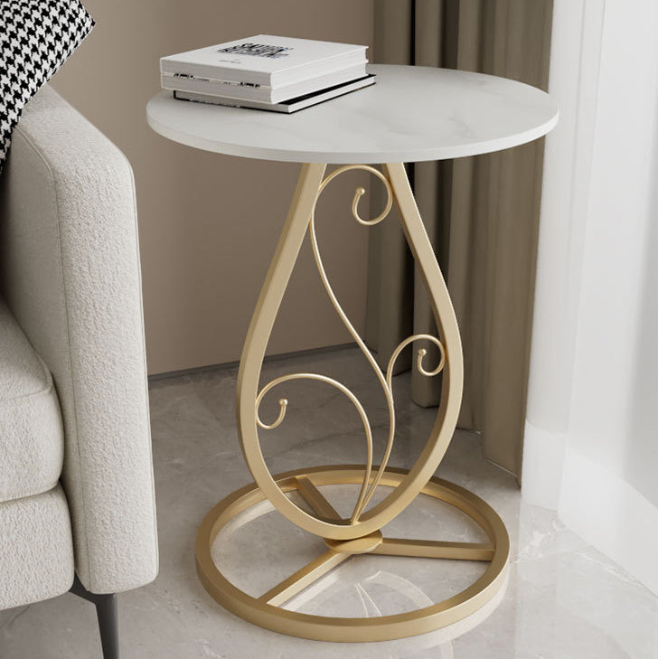 Table basse moderne de luxe ronde avec plateau en pierre frittée et base en métal pour salon 