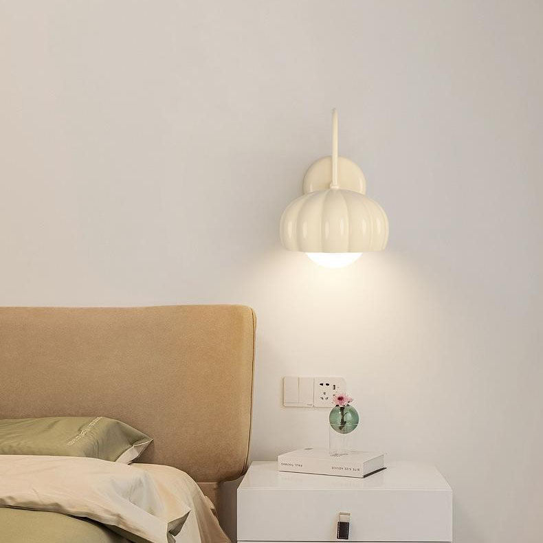 Moderne minimalistische cremefarbene ovale Wandleuchte aus Kunstharz PE mit 1 Licht für Schlafzimmer 
