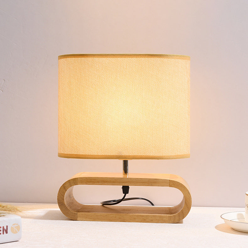 Contemporary Nordic Wood Fabric Cylinder Elliptical 1-Light Table Lamp For Study