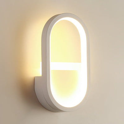 Moderne minimalistische Eisen Silikon elliptische Kreisbogen LED Wandleuchte Lampe für Schlafzimmer 