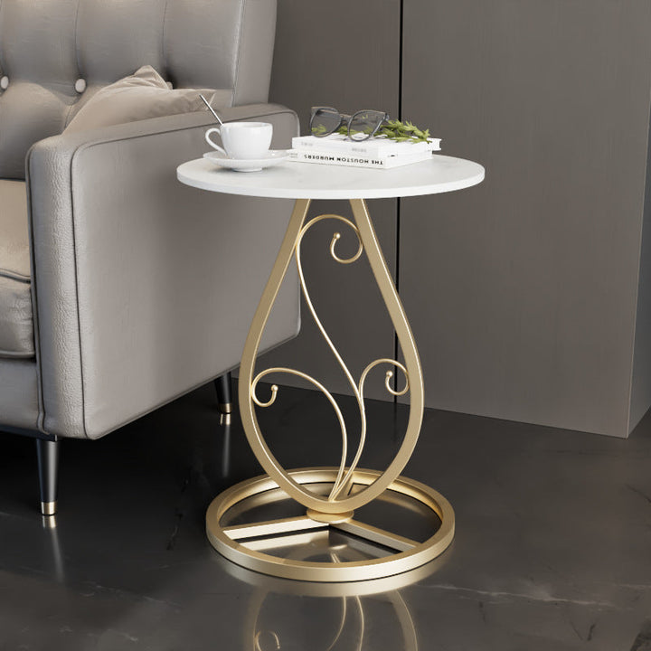 Table basse moderne de luxe ronde avec plateau en pierre frittée et base en métal pour salon 