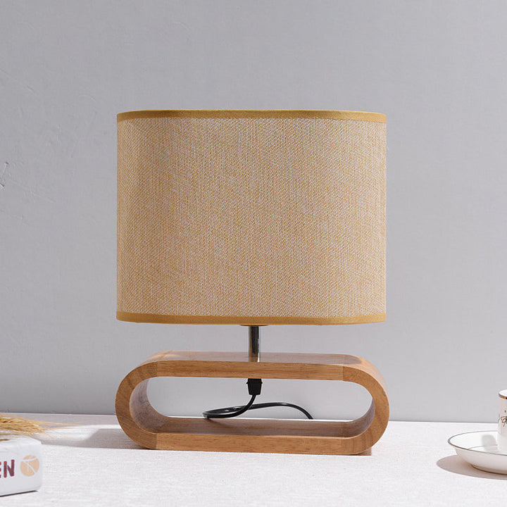 Lámpara de mesa contemporánea nórdica de cilindro de tela de madera elíptica de 1 luz para estudio 
