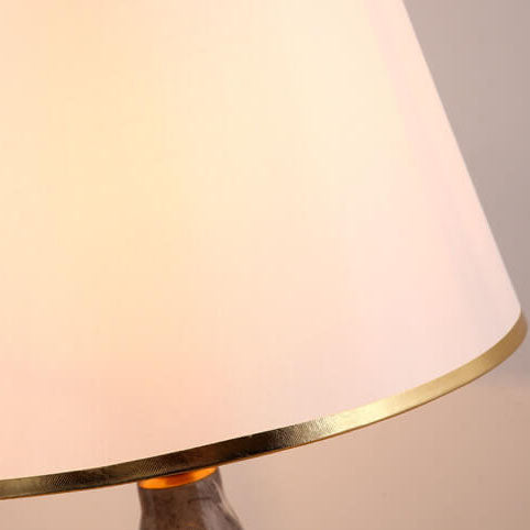Pantalla de lámpara de tela simple nórdica con patrón de piedra Base de cerámica 1-luz lámpara de mesa 