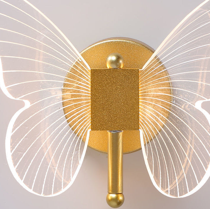 Lámpara de pared LED de hierro acrílico en forma de mariposa creativa contemporánea para dormitorio 