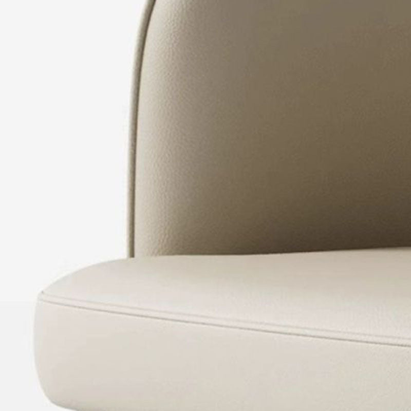Chaise de salle à manger moderne de luxe ronde en similicuir avec dossier incurvé en acier au carbone 