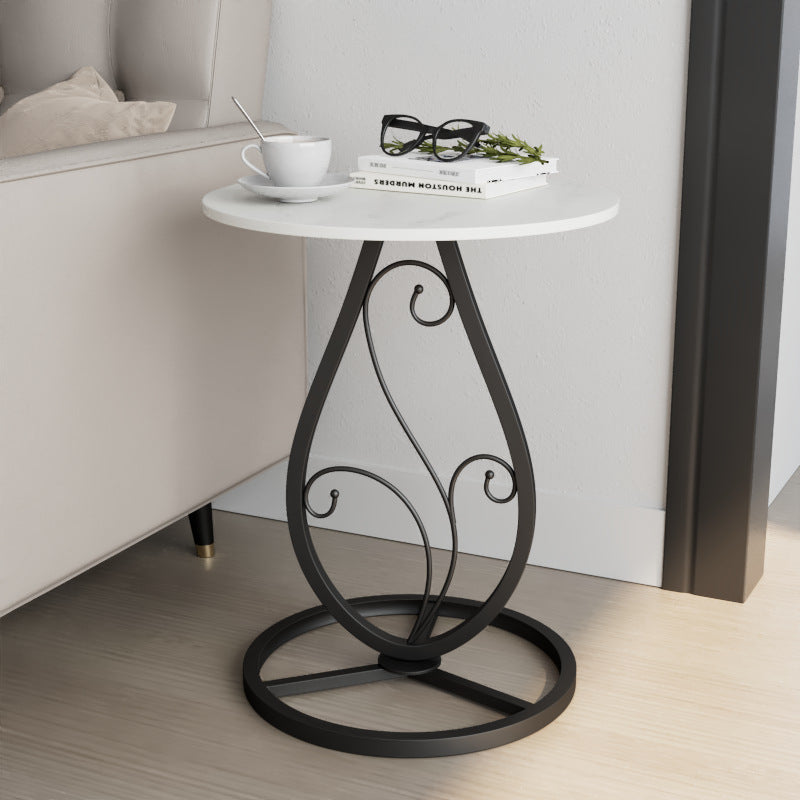 Table basse moderne de luxe ronde avec plateau en pierre frittée et base en métal pour salon 