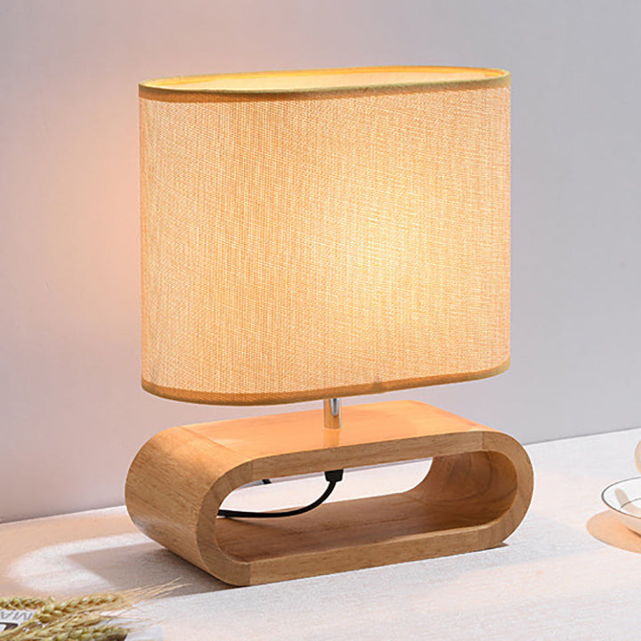 Lámpara de mesa contemporánea nórdica de cilindro de tela de madera elíptica de 1 luz para estudio 