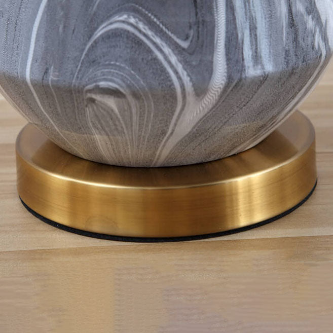 Pantalla de lámpara de tela simple nórdica con patrón de piedra Base de cerámica 1-luz lámpara de mesa 