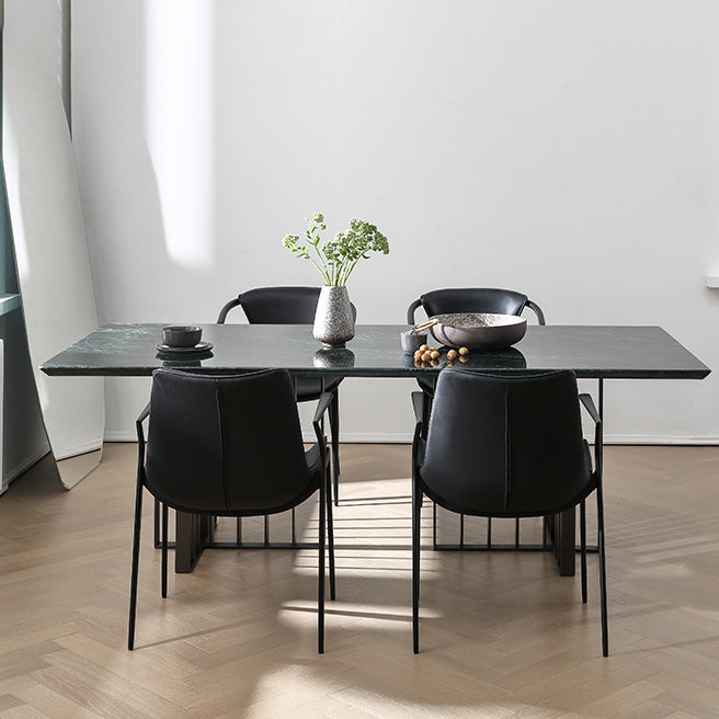 Chaise de salle à manger en cuir et métal avec dossier trapézoïdal minimaliste moderne pour salle à manger 