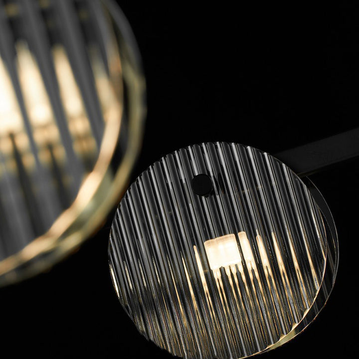 Lámpara de araña LED moderna minimalista de aros de hierro, vidrio y acrílico para salón 