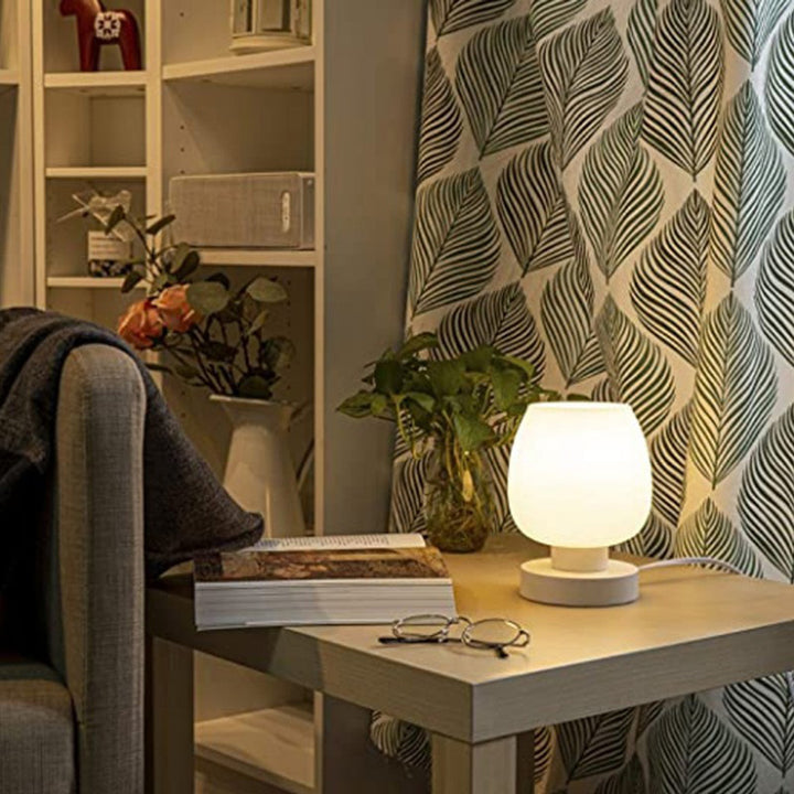 Moderne minimalistische flache runde Glaseisen 1-Licht Tischlampe für Wohnzimmer 