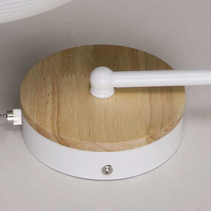 Moderne minimalistische Macaron gebogene Stange Runde Tasse Eisen Holz 1-Licht Wandleuchte Lampe für Schlafzimmer