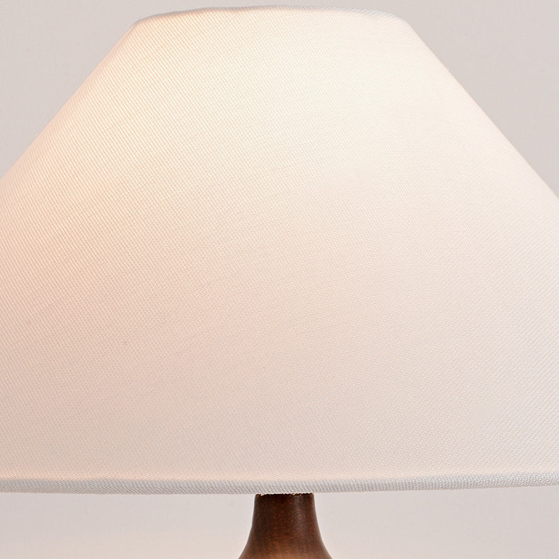 Lámpara de mesa contemporánea retro de madera de fresno y lino con pantalla trapezoidal redonda de 1 luz para dormitorio 