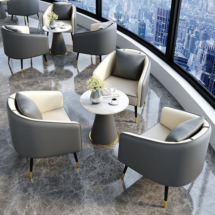 Table basse contemporaine de luxe avec plateau rond en pierre frittée et base en métal pour salon 