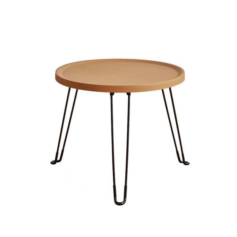 Table basse moderne minimaliste ronde en acier au carbone PP pliable pour salon 