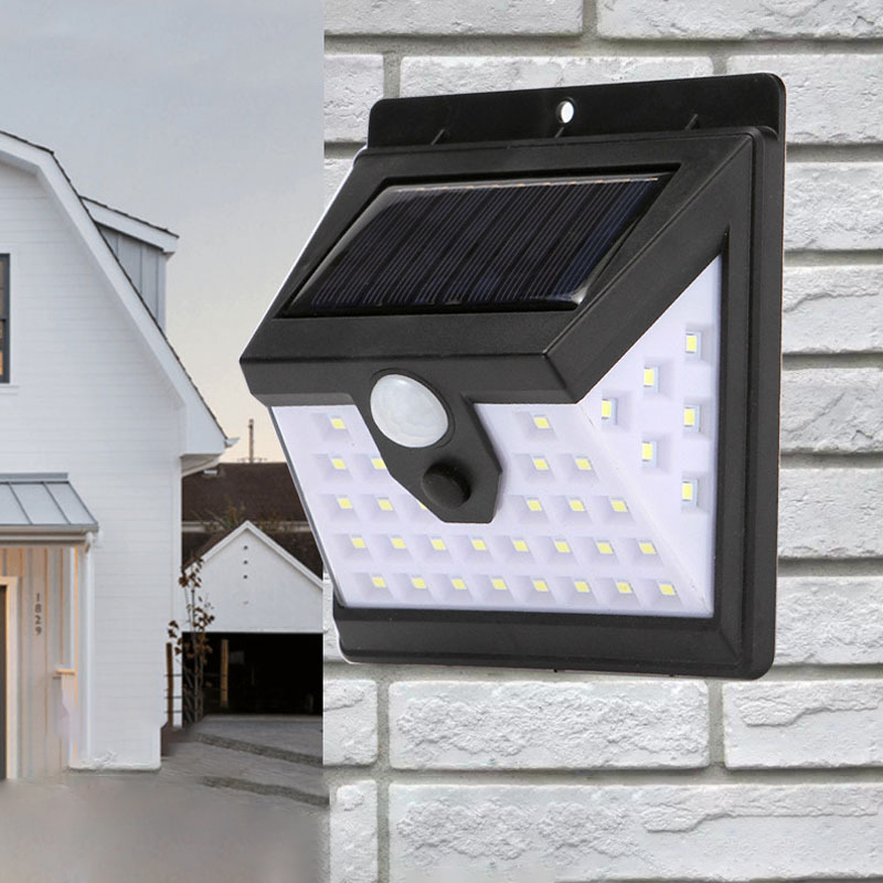 مصباح جداري LED مستطيل من ABS مع مستشعر حركة مقاوم للماء بالطاقة الشمسية بتصميم بسيط وحديث للفناء الخارجي 