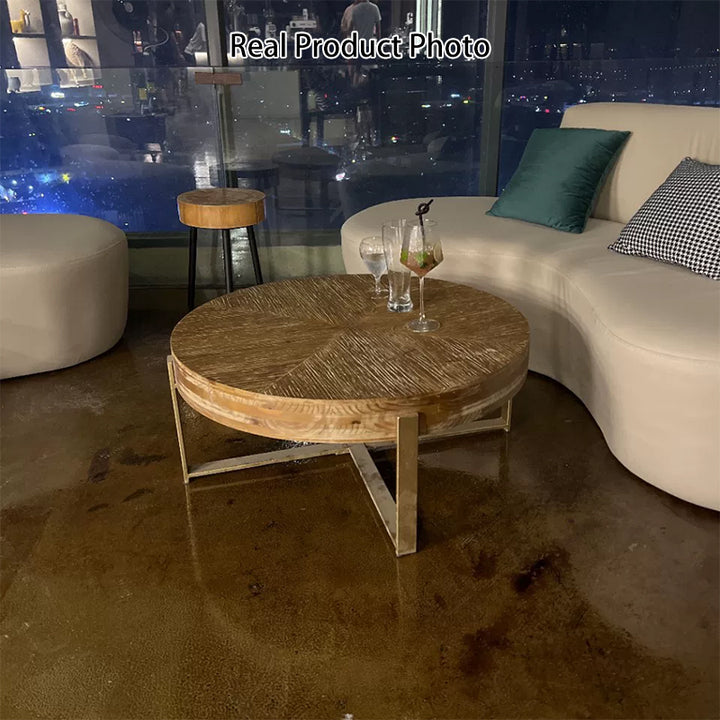 Traditioneller runder Vintage-Couchtisch aus MDF-Holz mit Used-Look und Eisen-Kreuzbeinen für das Wohnzimmer 