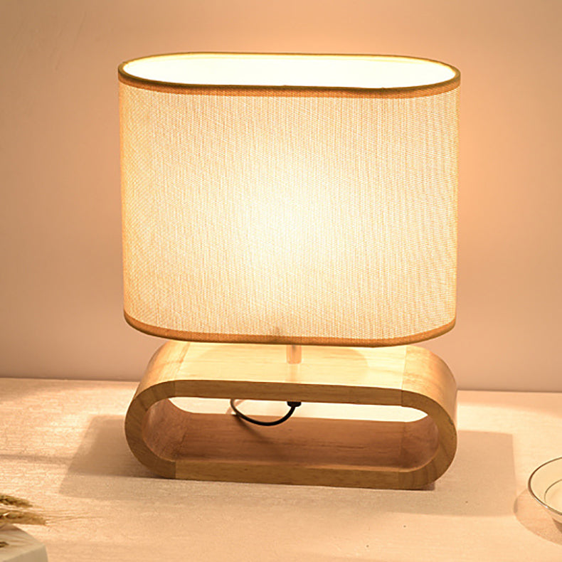 Lámpara de mesa contemporánea nórdica de cilindro de tela de madera elíptica de 1 luz para estudio 