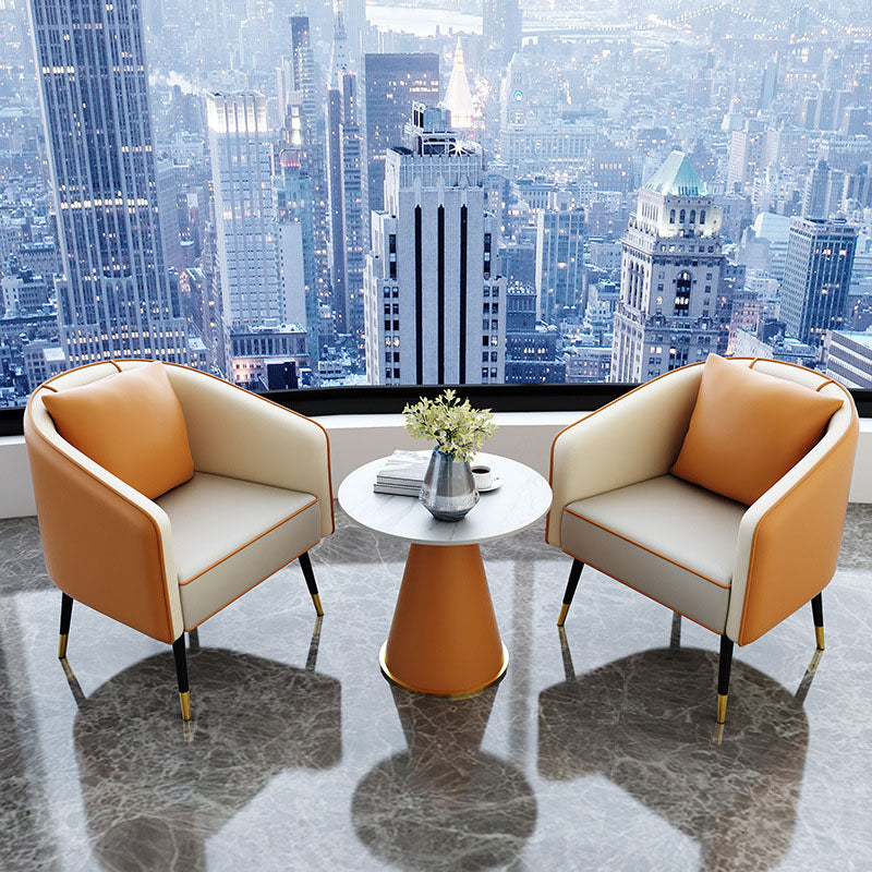 Table basse contemporaine de luxe avec plateau rond en pierre frittée et base en métal pour salon 