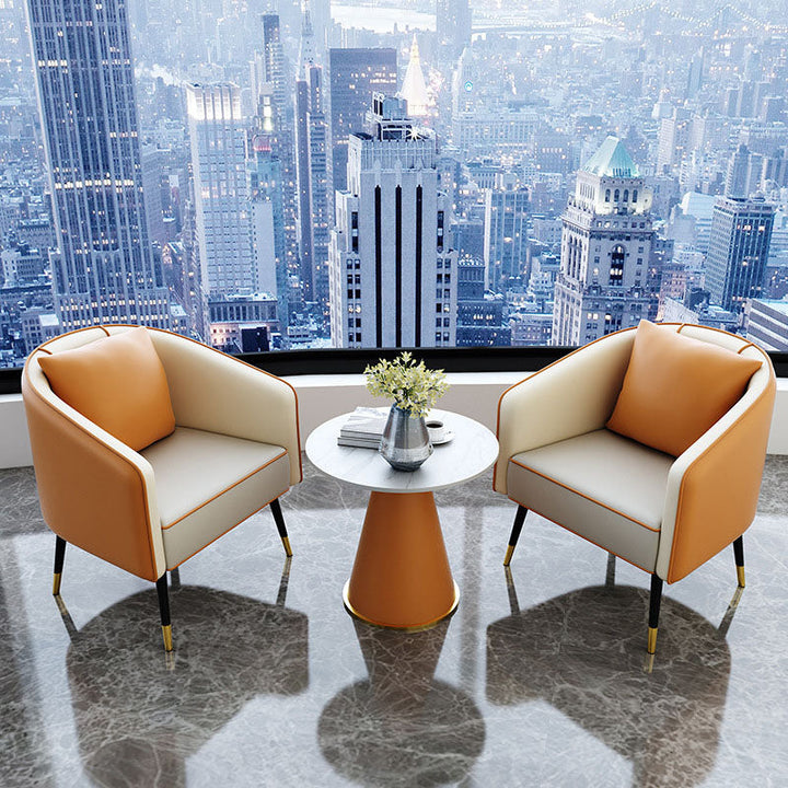 Table basse contemporaine de luxe avec plateau rond en pierre frittée et base en métal pour salon 
