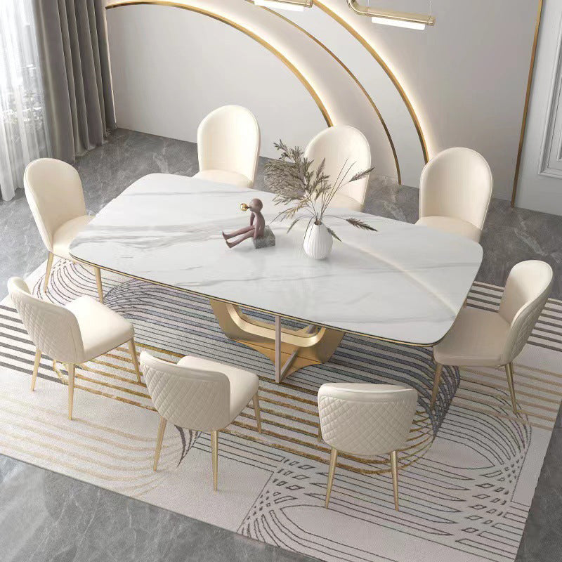 Chaise de salle à manger contemporaine nordique en cuir incurvé avec dossier rembourré et pieds effilés en métal 