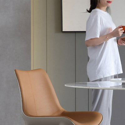 Chaise de salle à manger moderne en cuir de vache simplicité en acier éponge carrée avec dossier incurvé pour salle à manger 