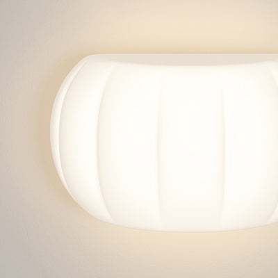 Applique murale LED elliptique en forme de citrouille en fer et acrylique de simplicité moderne pour chevet 