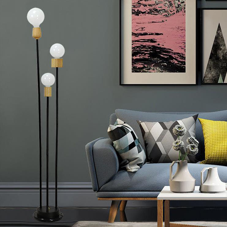 Lampe de sol industrielle rétro en fer avec cadre noir fini et trois globes en verre 