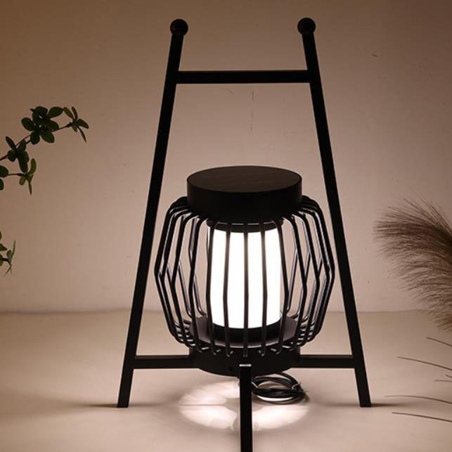 Luz de paisaje LED al aire libre con jaula de acero inoxidable simple y moderna solar 