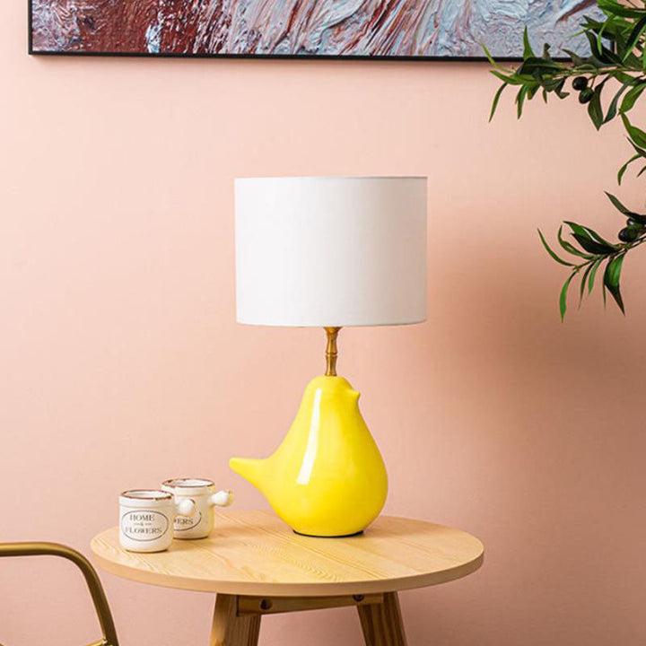 Lámpara de mesa de 1 luz con base de cerámica y pantalla cilíndrica creativa contemporánea para dormitorio 