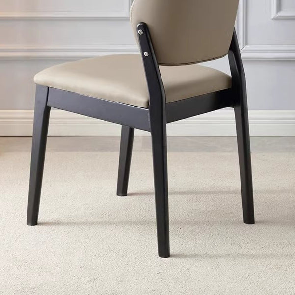 Chaise de salle à manger contemporaine nordique en similicuir rembourré avec dossier ouvert sans accoudoirs pour salle à manger 