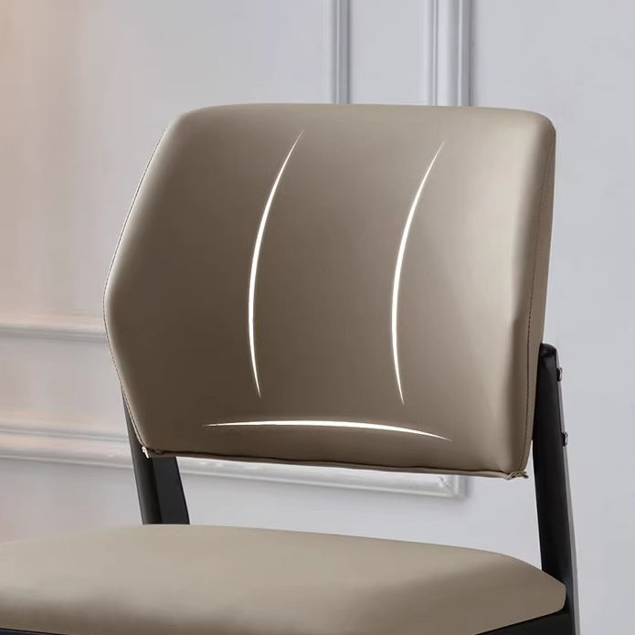 Chaise de salle à manger contemporaine nordique en similicuir rembourré avec dossier ouvert sans accoudoirs pour salle à manger 