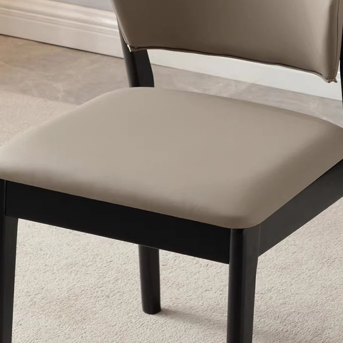 Chaise de salle à manger contemporaine nordique en similicuir rembourré avec dossier ouvert sans accoudoirs pour salle à manger 