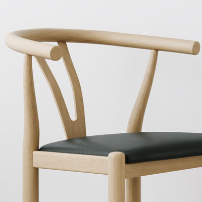 Chaise de salle à manger avec dossier incurvé carré en cuir de simplicité moderne, acier au carbone et éponge 