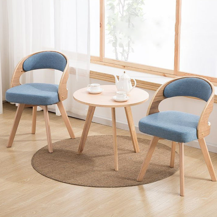 Silla de comedor con patas de madera contemporáneas nórdicas tapizadas en tela, respaldo curvado para comedor 
