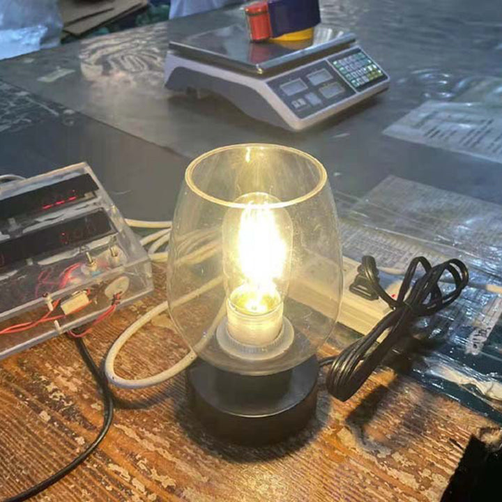 Moderne minimalistische flache runde Glaseisen 1-Licht Tischlampe für Wohnzimmer 