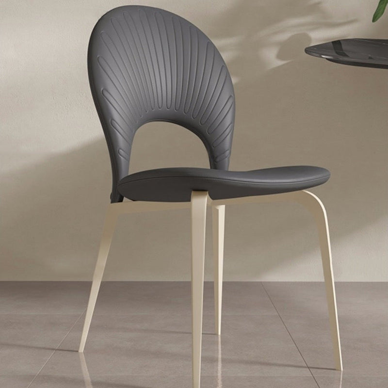 Contemporáneo Nórdico Redondo Tapizado en Cuero Sintético Patas de Acero al Carbono Silla de Comedor Respaldo Sin Brazos Para Comedor 