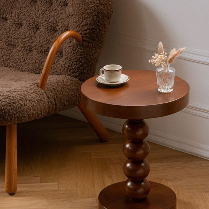 Table basse ronde vintage traditionnelle en bois perlé pour salon 